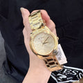 Guess Cubed Analog Gold Dial Gold Steel Strap Watch For Women - GW0606L2