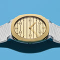 Gucci 25H Quartz Gold Dial Silver Steel Strap Watch for Men - YA163405
