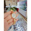 Calvin Klein Authentic Silver Dial Gold Steel Strap Watch for Women - K8G23546